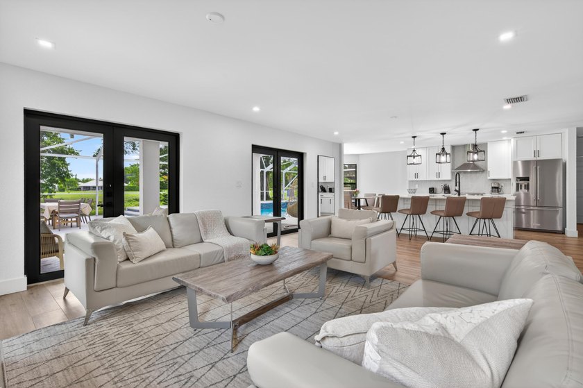 Welcome to this exceptional luxury pool estate in one of - photo 9