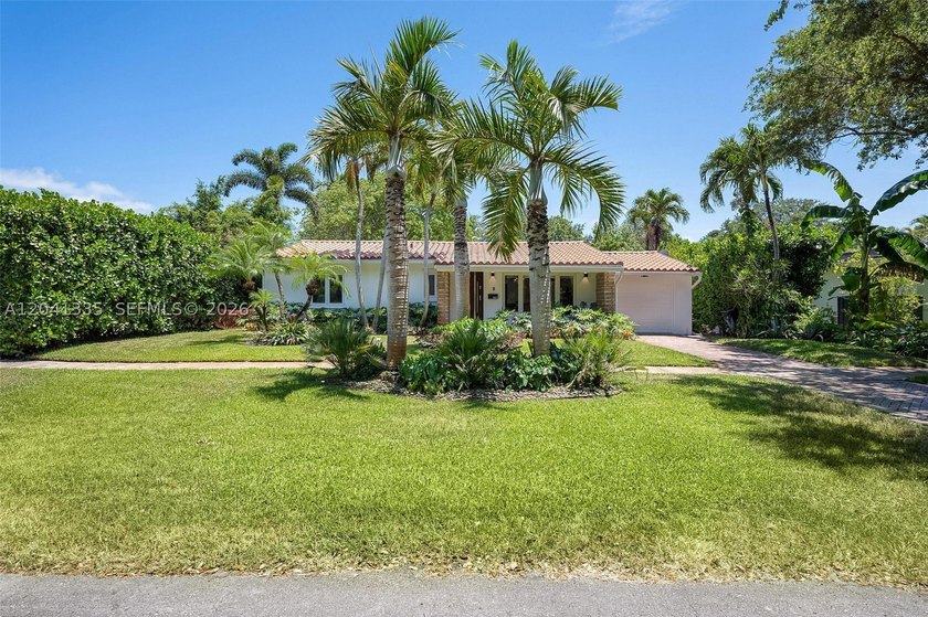 Introducing this exquisite 3-bedroom, 3-bath Miami Shores - photo 3