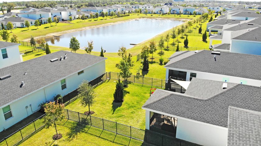 This new single-story home features a smart layout designed for - photo 3