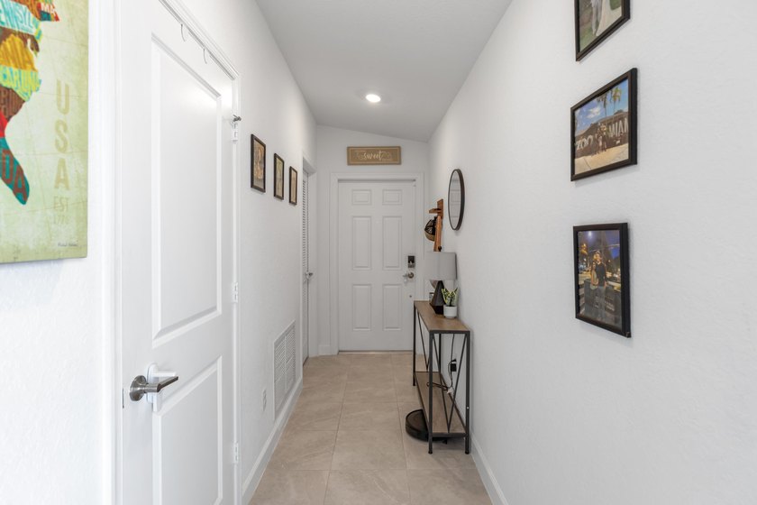 This new single-story home features a smart layout designed for - photo 9