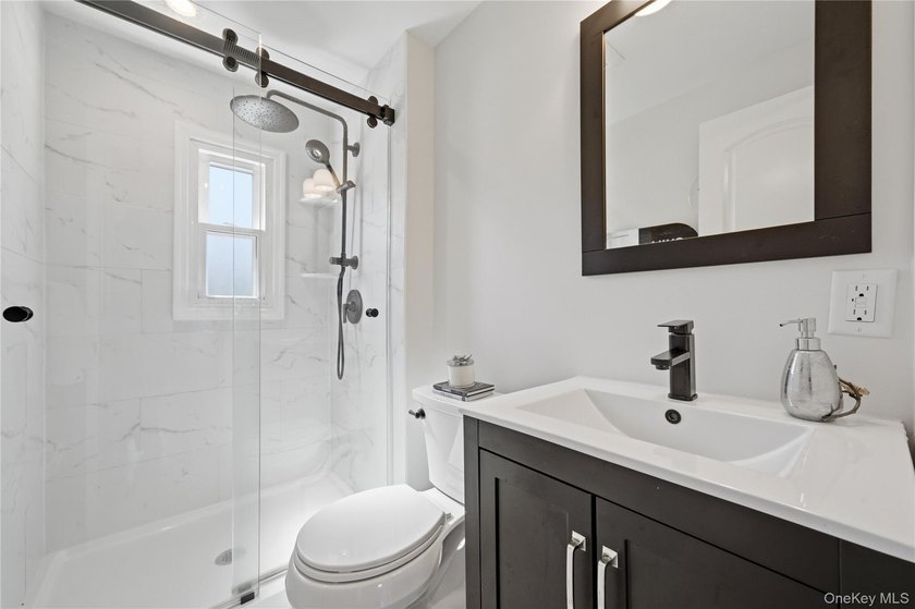 Set in the heart of West Islip, this beautifully updated - photo 27
