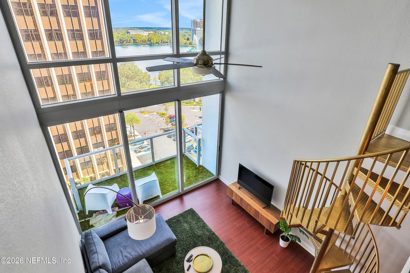 Wake up to breathtaking sunrise views over Lake Eola from this - photo 19