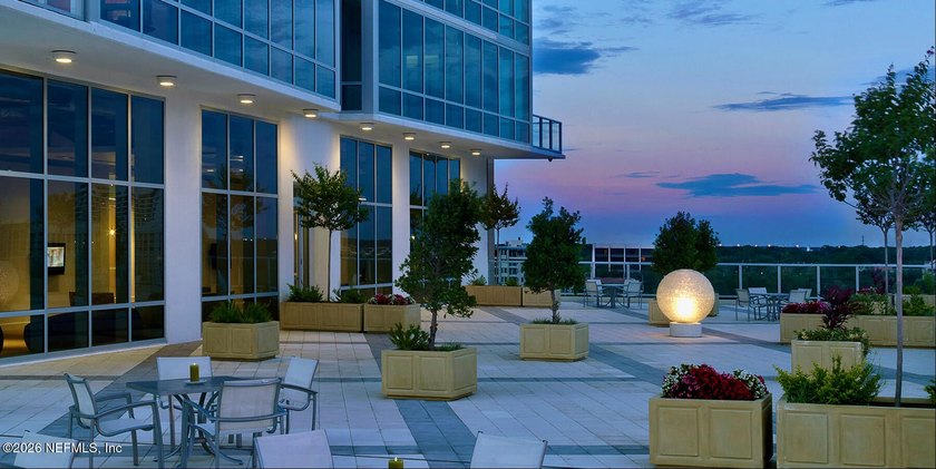 Wake up to breathtaking sunrise views over Lake Eola from this - photo 21