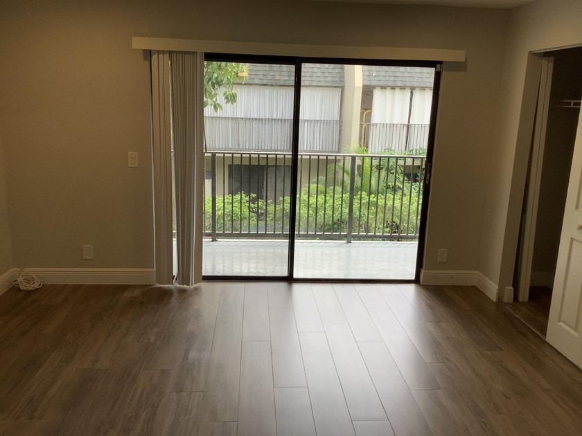This beautifully renovated 2-bedroom, 2-bathroom townhouse is - photo 12