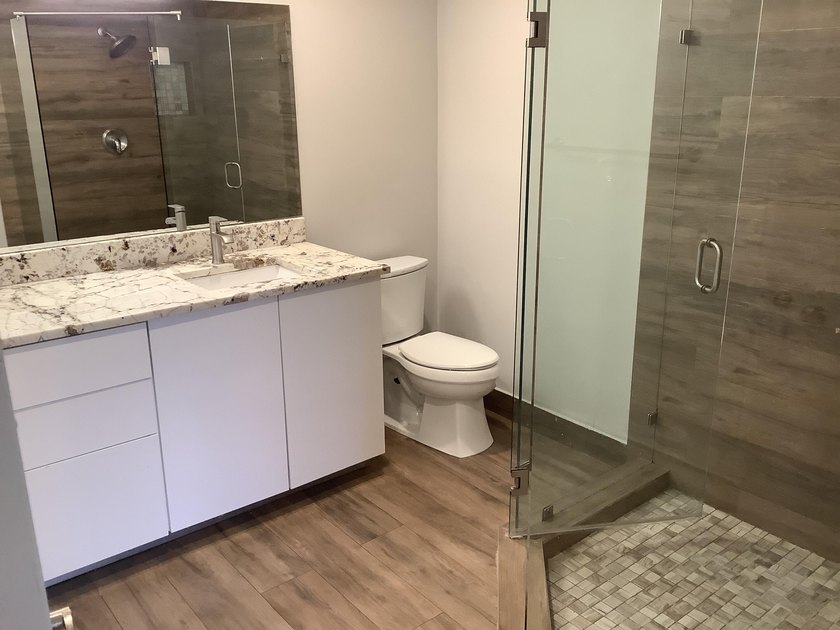 This beautifully renovated 2-bedroom, 2-bathroom townhouse is - photo 14