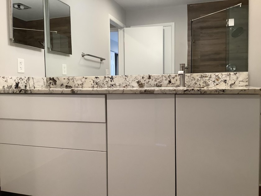 This beautifully renovated 2-bedroom, 2-bathroom townhouse is - photo 17