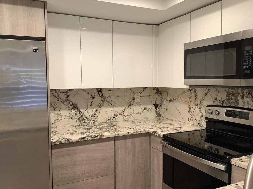 This beautifully renovated 2-bedroom, 2-bathroom townhouse is - photo 18
