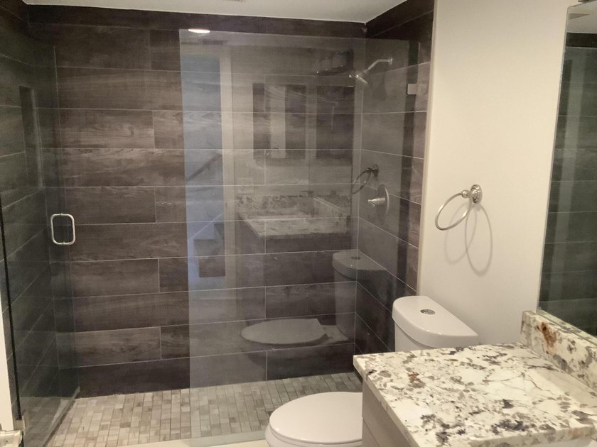 This beautifully renovated 2-bedroom, 2-bathroom townhouse is - photo 20
