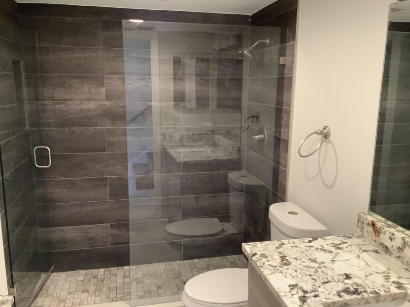 This beautifully renovated 2-bedroom, 2-bathroom townhouse is - photo 21