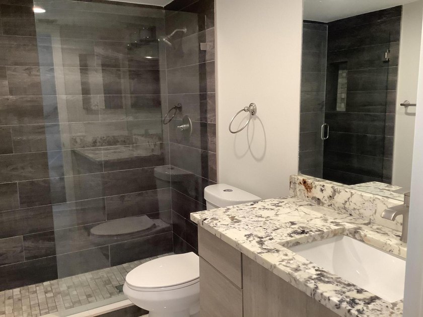 This beautifully renovated 2-bedroom, 2-bathroom townhouse is - photo 22
