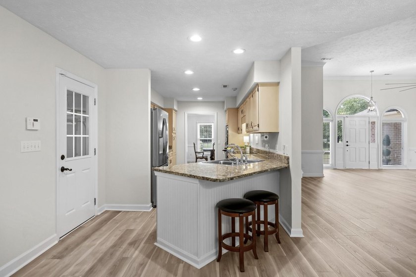 The best in one-level living starts here. Panoramic golf course - photo 16