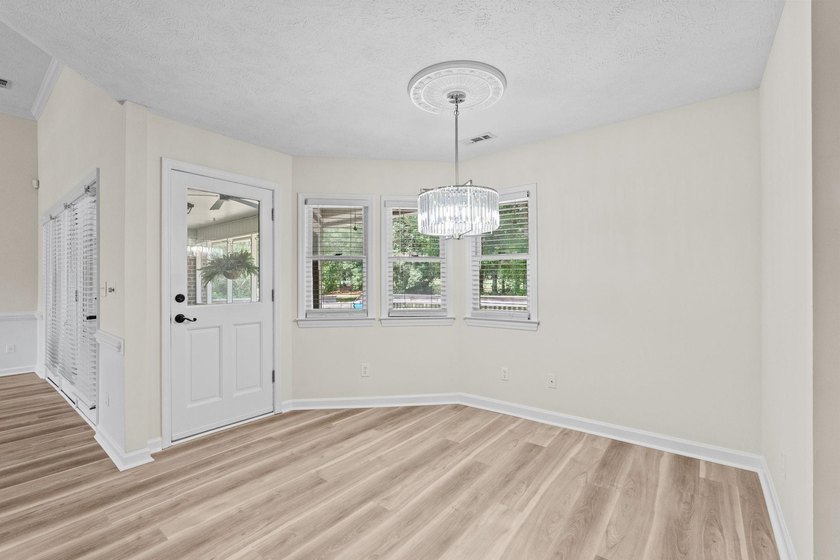 The best in one-level living starts here. Panoramic golf course - photo 18