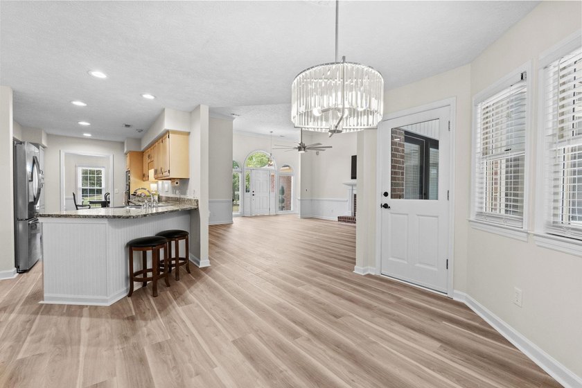The best in one-level living starts here. Panoramic golf course - photo 19