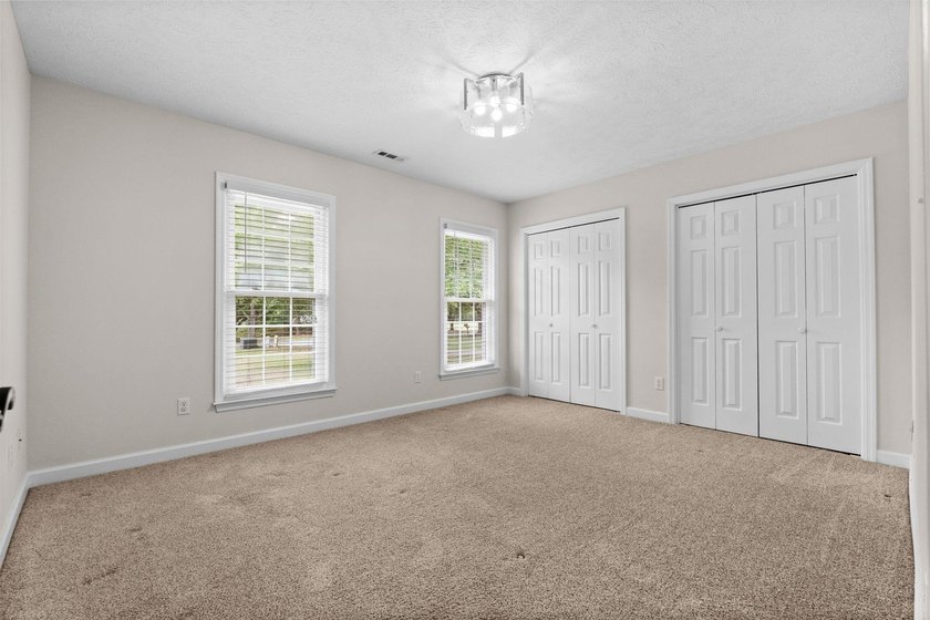 The best in one-level living starts here. Panoramic golf course - photo 28