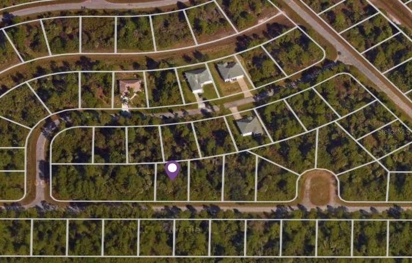 This spacious vacant lot is ready for your new home or - photo 3
