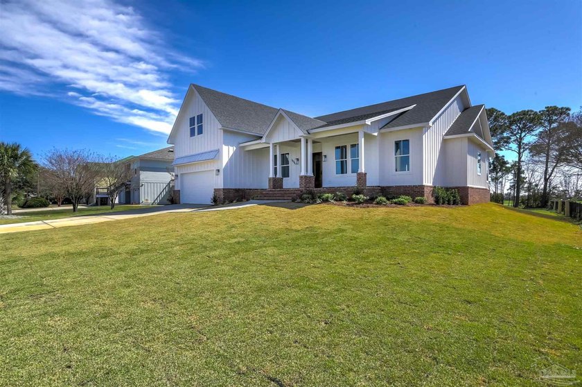 New Construction in a fantastic location in the Tiger Point Golf - photo 3
