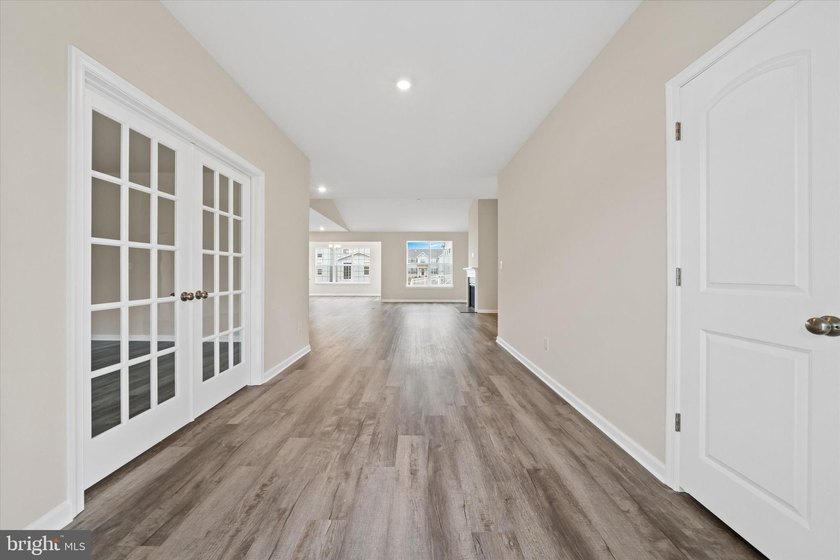 The Jefferson, an impressive ranch home, features single-level - photo 4