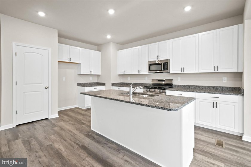 The Jefferson, an impressive ranch home, features single-level - photo 9