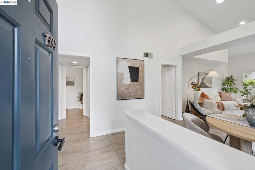 This is it! Rare end-unit townhome that lives like a - photo 4
