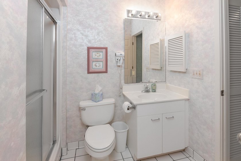 This three-bedroom, three-bath residence is priced to sell and - photo 24