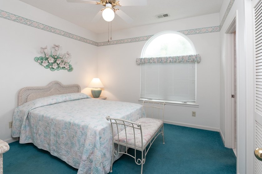This three-bedroom, three-bath residence is priced to sell and - photo 25