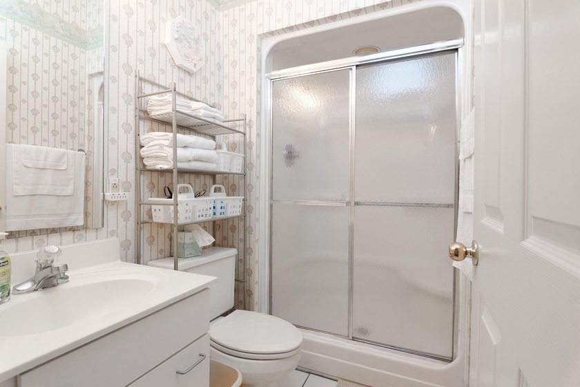 This three-bedroom, three-bath residence is priced to sell and - photo 30
