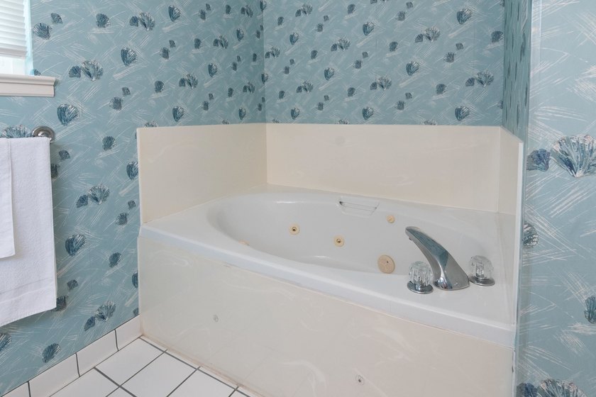 This three-bedroom, three-bath residence is priced to sell and - photo 37