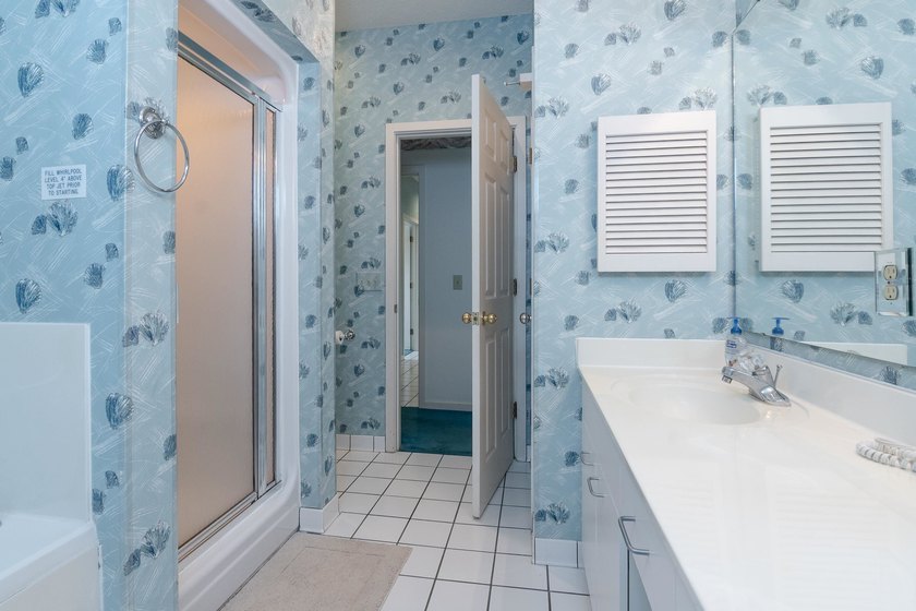 This three-bedroom, three-bath residence is priced to sell and - photo 38