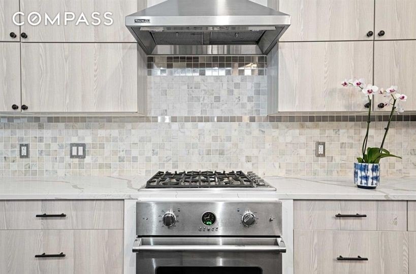 Welcome to 308 Clifton Place, a renovated townhouse nestled in - photo 4