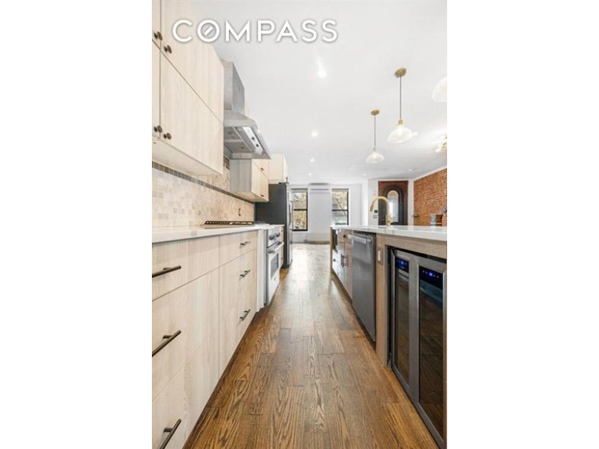 Welcome to 308 Clifton Place, a renovated townhouse nestled in - photo 5