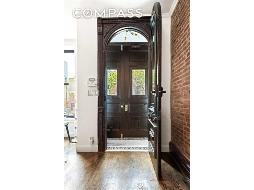 Welcome to 308 Clifton Place, a renovated townhouse nestled in - photo 10