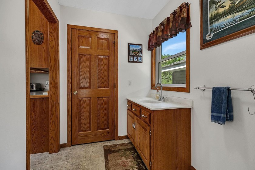This unique riverfront property offers several hundred ft of - photo 17