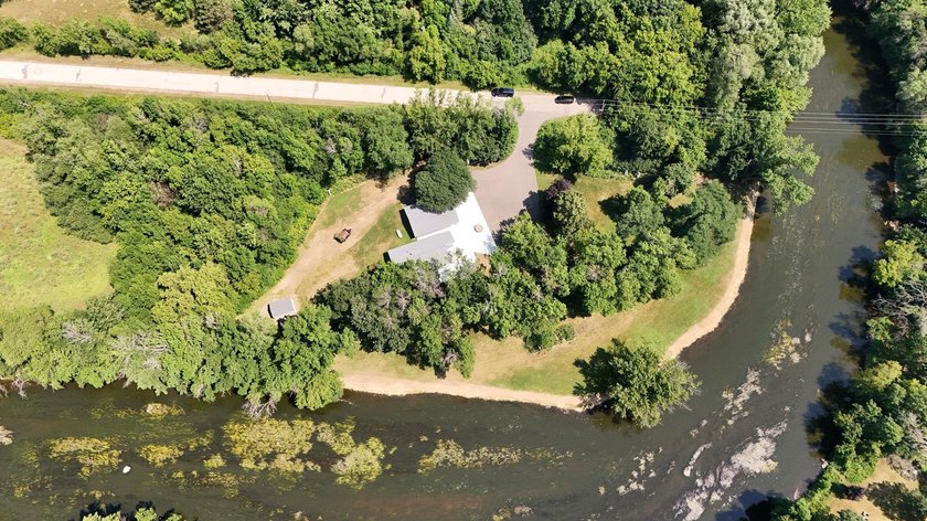 This unique riverfront property offers several hundred ft of - photo 27