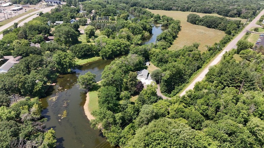 This unique riverfront property offers several hundred ft of - photo 30