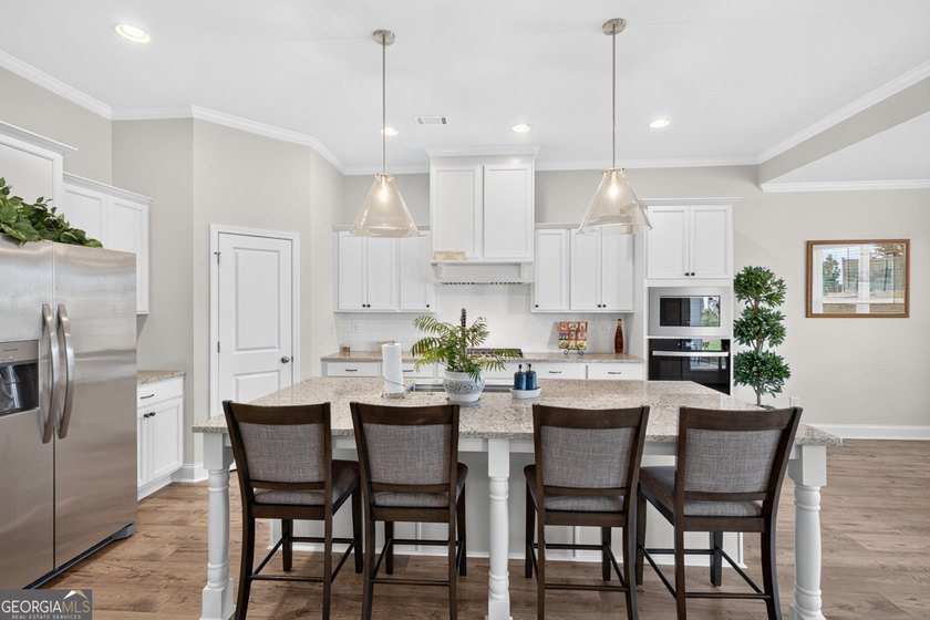 Luxury Living in a Vibrant 55+ Community Experience the perfect - photo 12