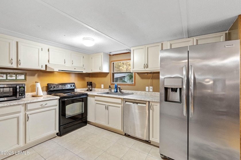 Less than one minute from the boat landing!! Three bedroom, two - photo 13