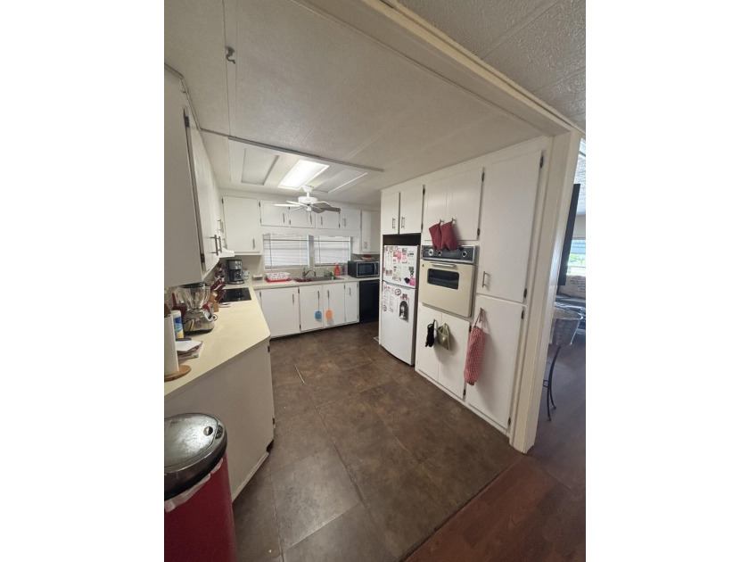 SPACIOUS HOME, VERY WELL MAINTAINED WITH 2 BEDROOMS, 2 BATHS AND - photo 18