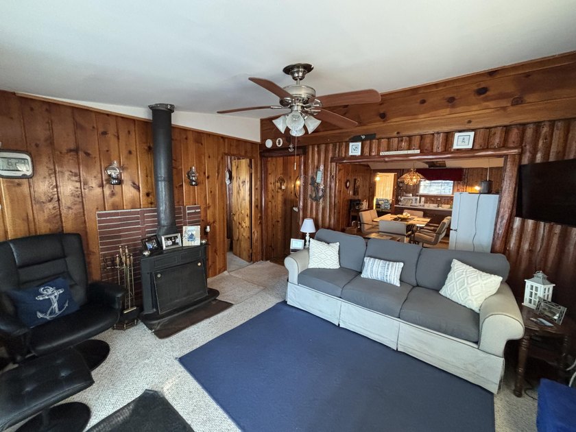 Your Up North LAKEFRONT GETAWAY is waiting! This turn-key - photo 3