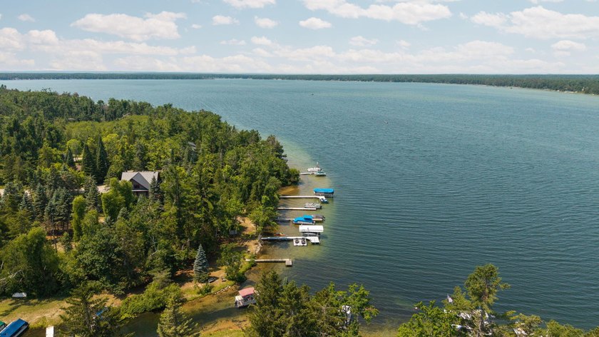 Experience exceptional lakefront living with 100 feet of - photo 6