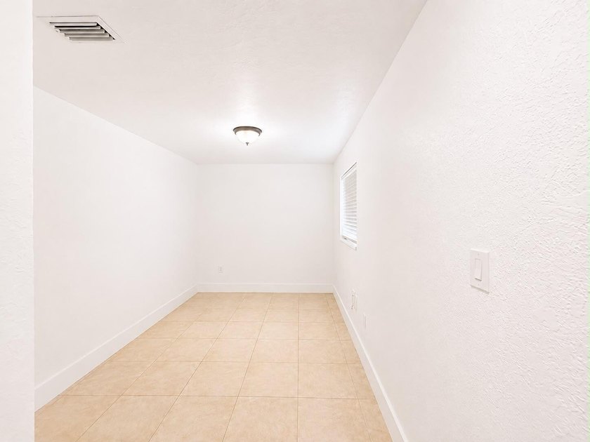 Welcome to this efficient 1-bedroom, 1-bathroom corner unit at - photo 7