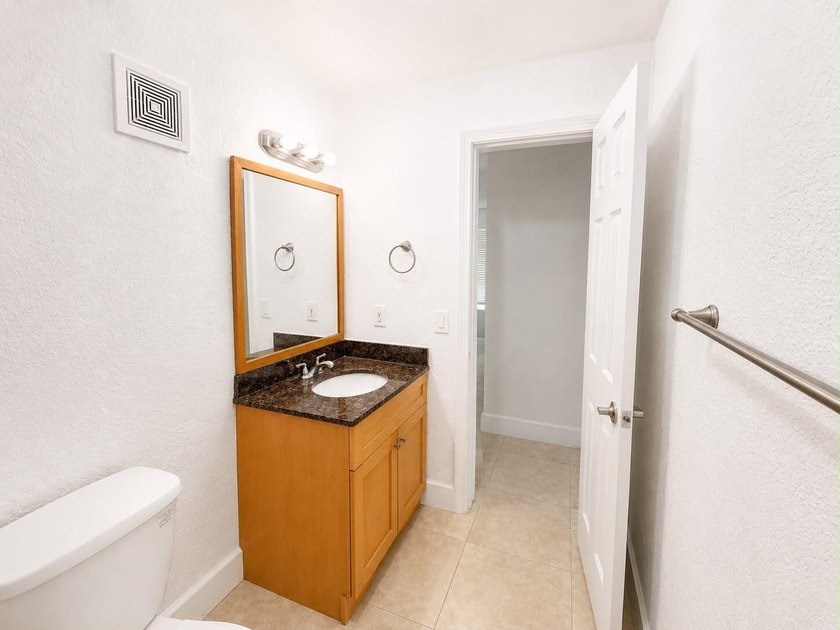 Welcome to this efficient 1-bedroom, 1-bathroom corner unit at - photo 8
