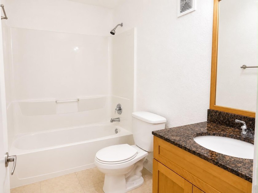 Welcome to this efficient 1-bedroom, 1-bathroom corner unit at - photo 9