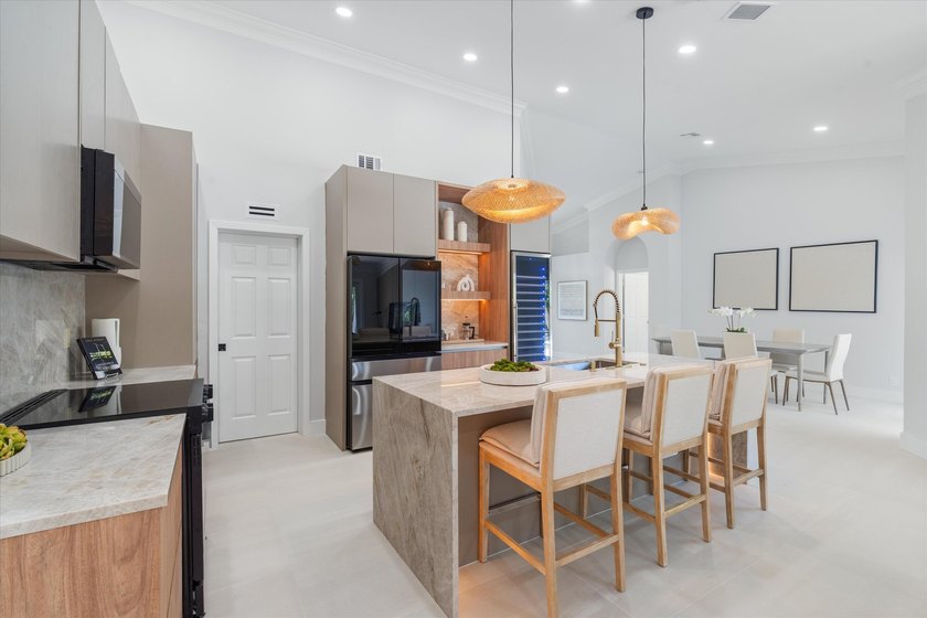 Located in the highly coveted subdivision of Boca Villas, this - photo 9