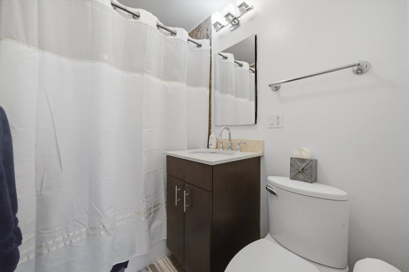Bathed in natural light, this modern southwest corner residence - photo 11