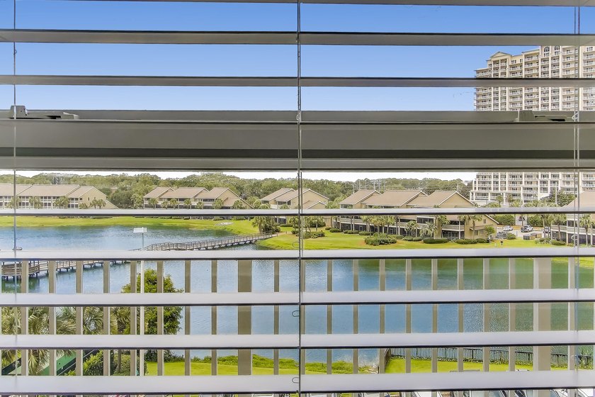 Enjoy your coastal dream in this stunning 2-bed, 2 bath condo at - photo 11