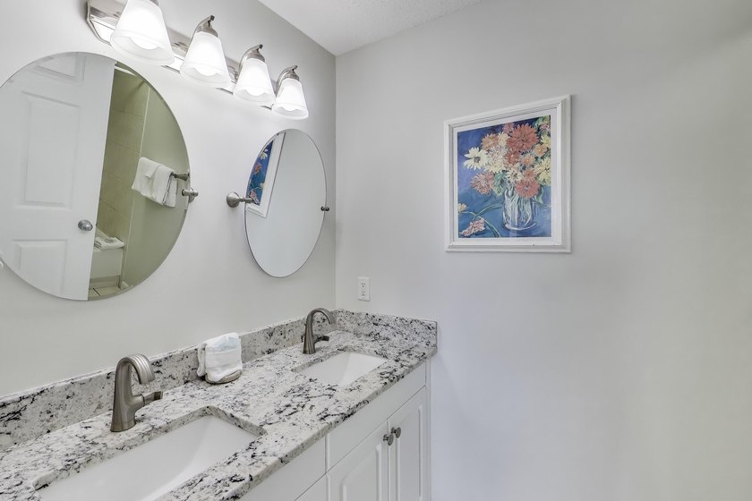 Enjoy your coastal dream in this stunning 2-bed, 2 bath condo at - photo 12