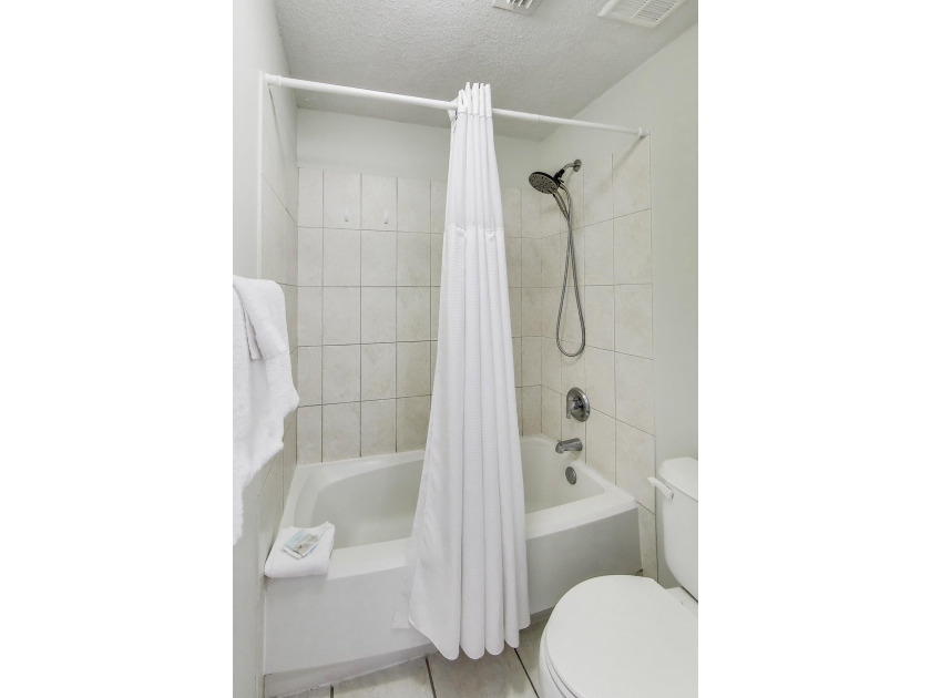Enjoy your coastal dream in this stunning 2-bed, 2 bath condo at - photo 13
