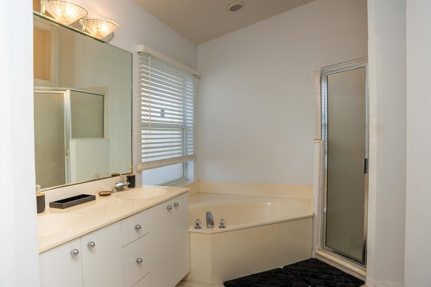 Discover this amazing home Pool home featuring 3 bedrooms, 2 - photo 12