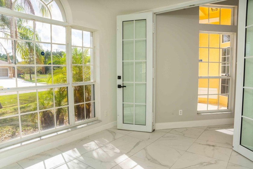 Discover this amazing home Pool home featuring 3 bedrooms, 2 - photo 14