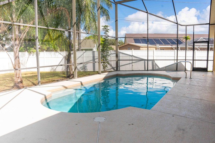 Discover this amazing home Pool home featuring 3 bedrooms, 2 - photo 18